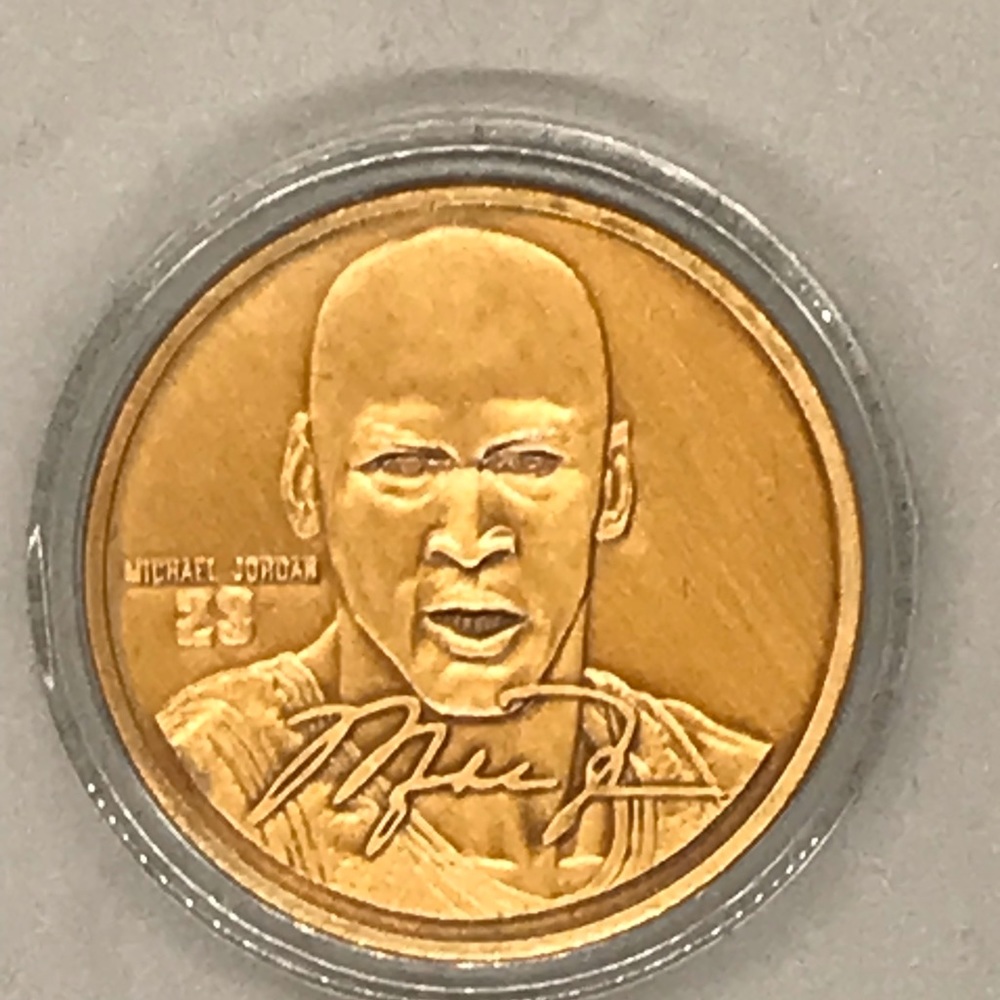 1995 Upper Deck/Highland Mint Limited Edition Michael Jordan bronze token.